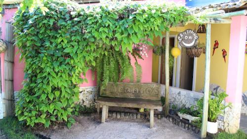 Ein Garten an der Unterkunft Encantos Pousada
