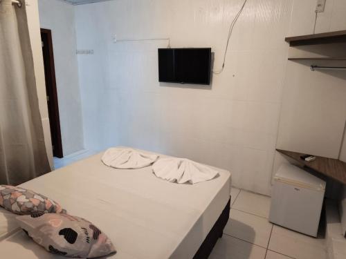Televisyen dan/atau pusat hiburan di Pousada Cantinho da Jake