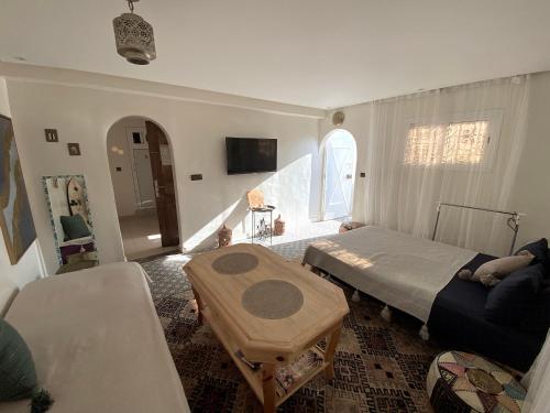 Postel nebo postele na pokoji v ubytování Tambarkiyt House Studio Appartement - Aourir Agadir