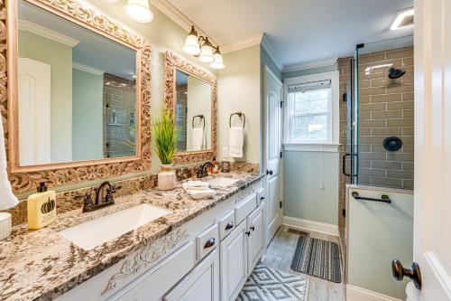 a bathroom with two sinks and a shower at Peaceful Home with Porch and Yard, 5 Mi to Rome! in Rome