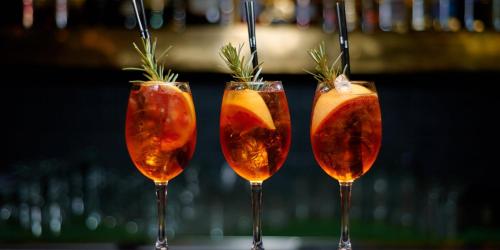a group of three wine glasses with fruit in them at Hotel Bristol Berlin in Berlin