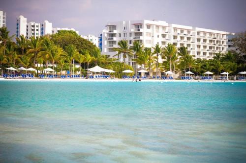 a large pool of water in front of a resort at Ocean Majesty in Playa Blanca