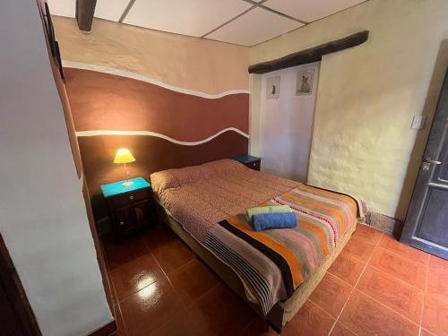 Postel nebo postele na pokoji v ubytování Casa los Molles Hostel