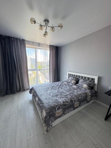 Uma cama ou camas num quarto em Зелена тераса