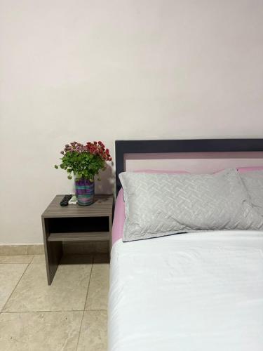 Postel nebo postele na pokoji v ubytování Arenamar Hotel Rodadero