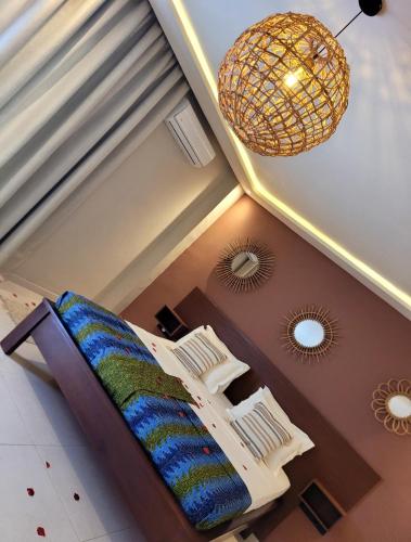 Katil atau katil-katil dalam bilik di B&B Klomiabla
