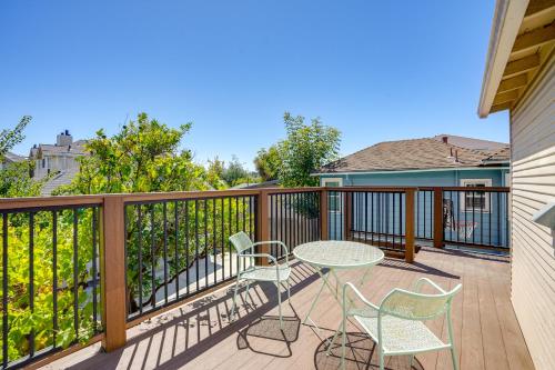 a patio with a table and chairs on a deck at 1 Mi to Dimond District Oakland Home with Deck in Canyon