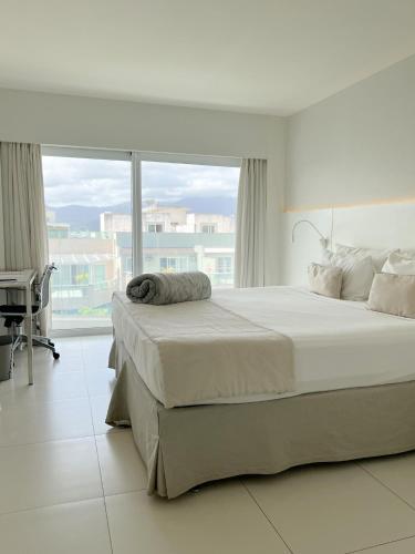Ein Bett oder Betten in einem Zimmer der Unterkunft CDesign Hotel