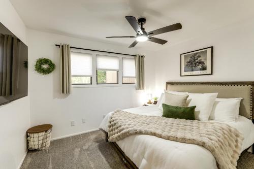 a bedroom with a bed and a ceiling fan at The High Country Hideaway Flagstaff Golf Retreat in East Flagstaff
