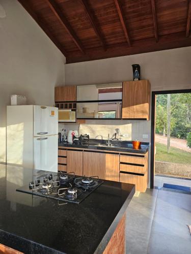Cuina o zona de cuina de Casa em Chácara com Cacheira