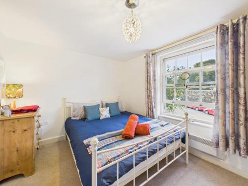 Ένα ή περισσότερα κρεβάτια σε δωμάτιο στο Penryn Quayside Apartment – 1-bed, Fully Equiped Waterside base