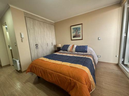 Ένα ή περισσότερα κρεβάτια σε δωμάτιο στο Departamento Home Studio