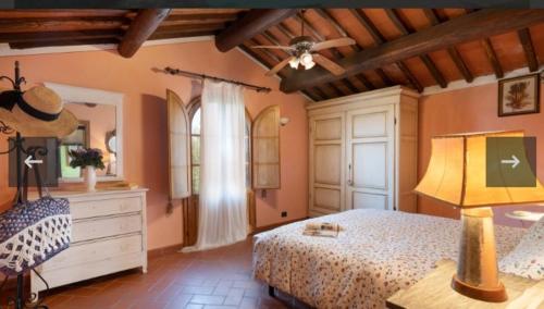 Un pat sau paturi într-o cameră la Holiday home Belvedere