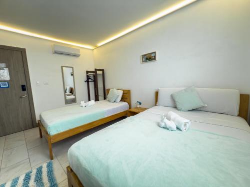 Postel nebo postele na pokoji v ubytování Libertad 109 Hotel