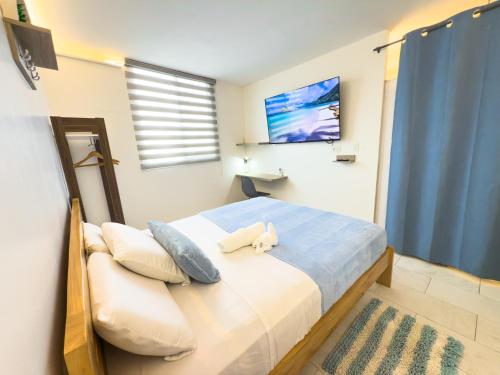 Postel nebo postele na pokoji v ubytování Libertad 109 Hotel