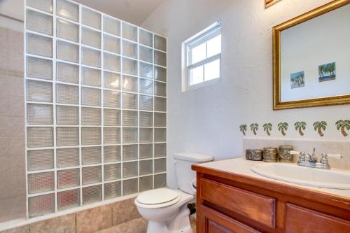 a bathroom with a toilet and a sink at View the Blue -Ground Level -Gold Standard Certified in Cayo Romero