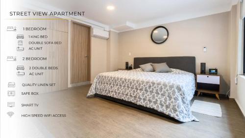 a bedroom with a bed and a wall with labels at 102 Centro 2Bdrm 2bath apt AC Rooftop in Mexico City