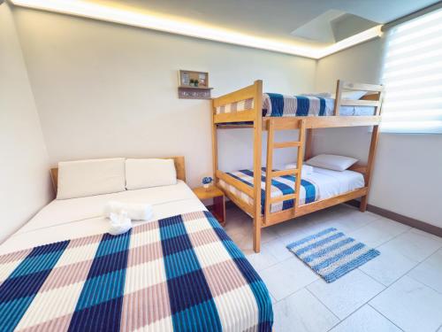 Postel nebo postele na pokoji v ubytování Libertad 109 Hotel