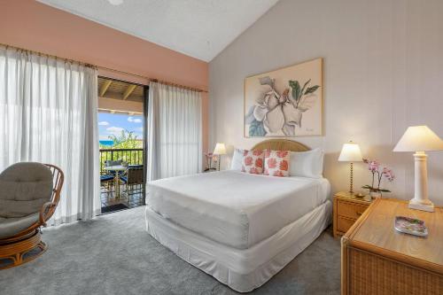 Wailea Ekahi 12D - Budget Friendly Ocean View Studio w/ Lanai, Kitchen, WD, & ACにあるベッド
