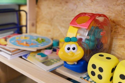 a toy figurine of a toy chicken sitting on a shelf at Wohlfühlnest in Steckborn