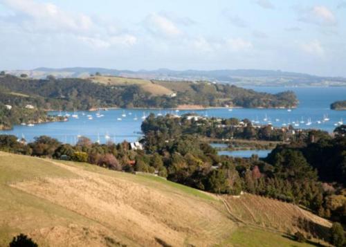 a view of a lake with boats in the water at Kereru Hill in Palm Beach