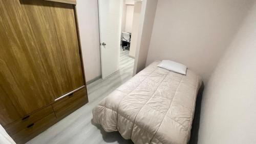 Ένα ή περισσότερα κρεβάτια σε δωμάτιο στο Tu estancia perfecta