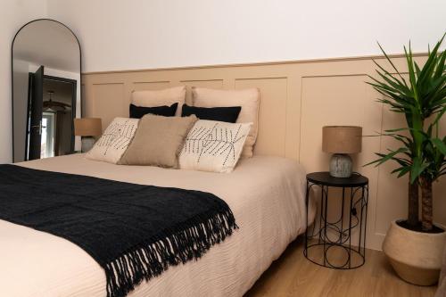 Ένα ή περισσότερα κρεβάτια σε δωμάτιο στο Le Yucca Apartment, Nature Stay