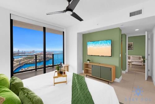 a living room with a view of the ocean at Luxury Apartment 3 Bedrooms Pool Gym Views & More in Miami