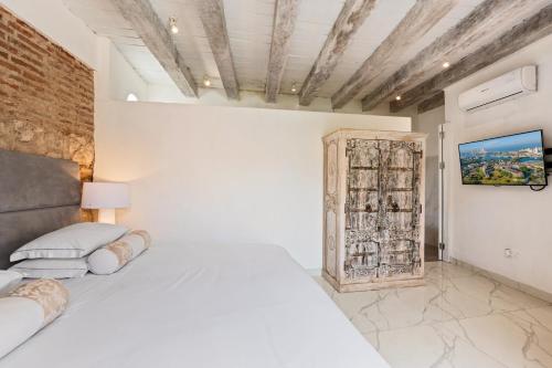 Postel nebo postele na pokoji v ubytování Upper Hotel