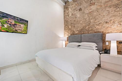 Postel nebo postele na pokoji v ubytování Upper Hotel