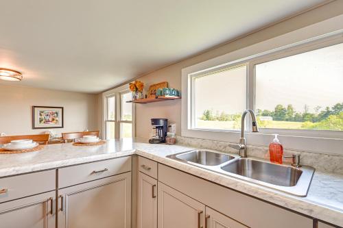 a kitchen with a sink and a window at Rock Climb, Hike, Relax! Quiet Beattyville Retreat in Beattyville