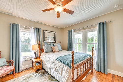 a bedroom with a bed and a ceiling fan at Rock Climb, Hike, Relax! Quiet Beattyville Retreat in Beattyville