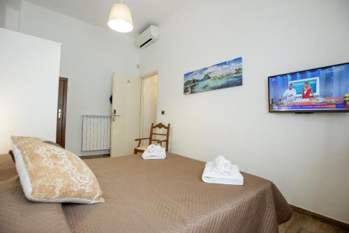 Una cama o camas en una habitación de La TERRAZZA