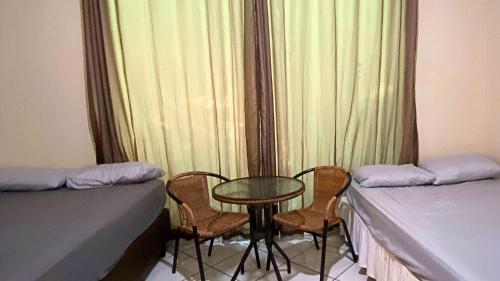 Katil atau katil-katil dalam bilik di Apartamentos Boca da Lagoa | Praia, Mata Atlântica e um Pôr do Sol Inesquecível