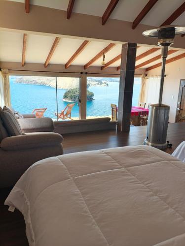 Letto o letti in una camera di Inti Illimani Lodge