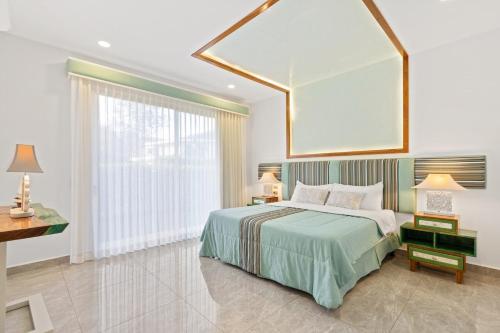 Кровать или кровати в номере Luxury Villa in Reserva Conchal Golf & Beach