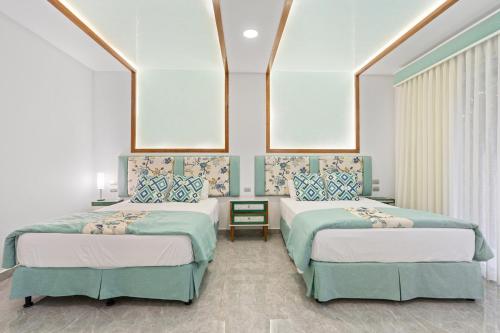 Кровать или кровати в номере Luxury Villa in Reserva Conchal Golf & Beach
