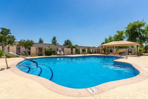 a large swimming pool at a resort at 3BR Southwest Modern Haven - Old Town in Scottsdale