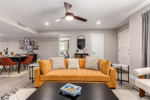 a living room with a couch and a dining room at 3BR Southwest Modern Haven - Old Town in Scottsdale