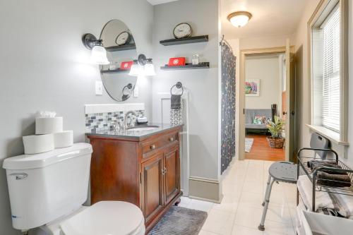 a bathroom with a toilet and a sink at Franklin Home with Deck, Creek Views Walk to Shops in Franklin