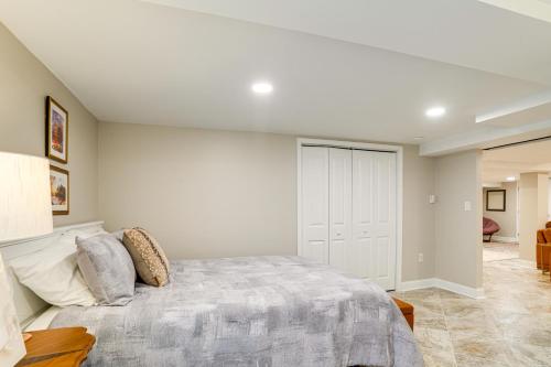 a bedroom with a large bed in a room at Shenandoah Valley Riverside Retreat Near Wineries in Grottoes