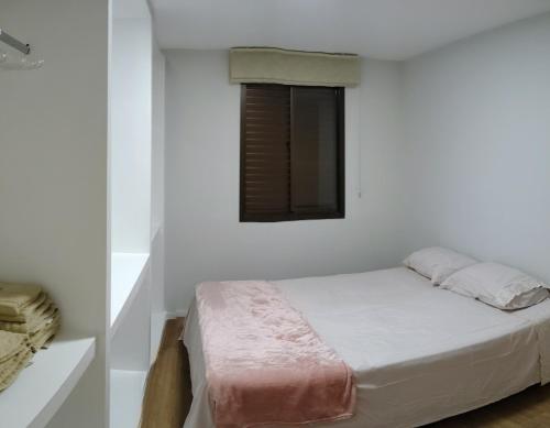 Ένα ή περισσότερα κρεβάτια σε δωμάτιο στο Apartamento 3 dormitórios Granja Viana