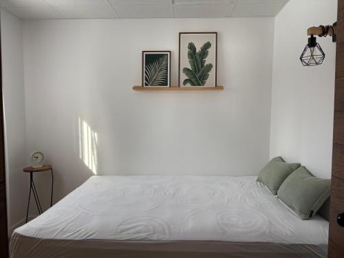 Кровать или кровати в номере Chalet la famille Savard