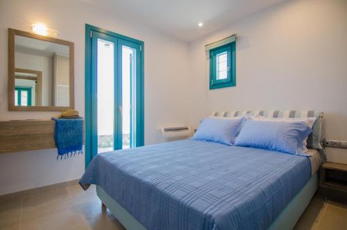 Katil atau katil-katil dalam bilik di Ios Sea View