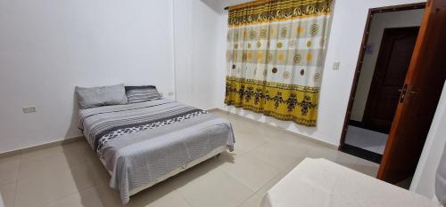 Llit o llits en una habitació de Villa flor