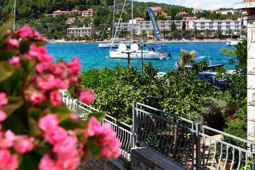 a view of a harbor with boats in the water at Luxory D-Rooms in Vela Luka