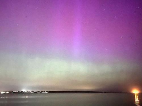 a purple sky with a reflection in the water at 4 person holiday home in Middelfart-By Traum in Middelfart