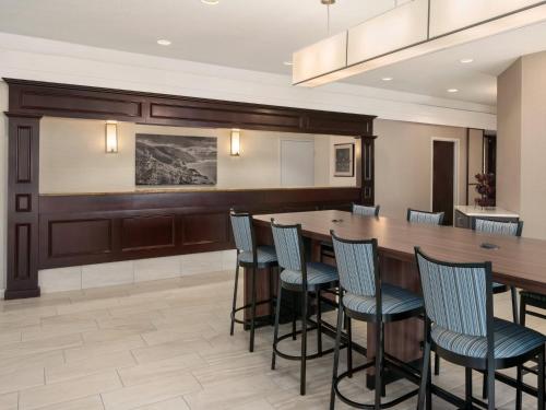 a large dining room with a long table and chairs at Travelodge by Wyndham Sydney in Sydney