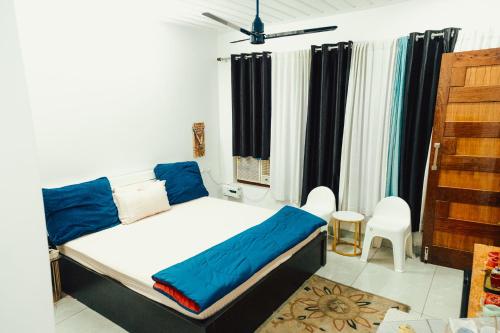 Voodi või voodid majutusasutuse JM Luxury Homestays toas