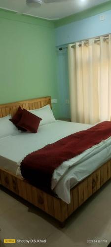 Una cama o camas en una habitación de Anita Palace